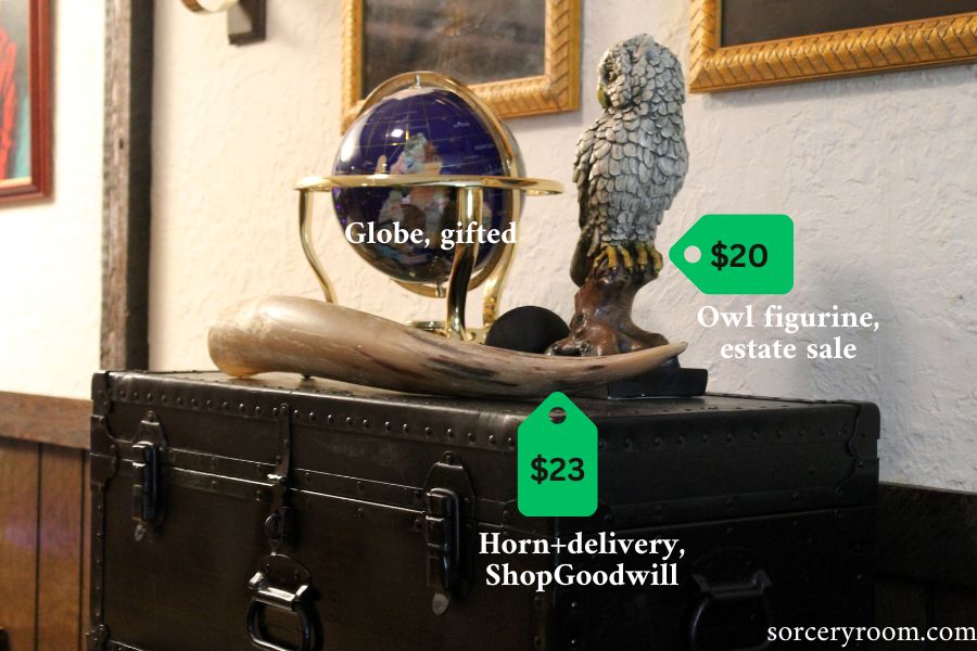 decor items: globe, owl figurine, horn, prices