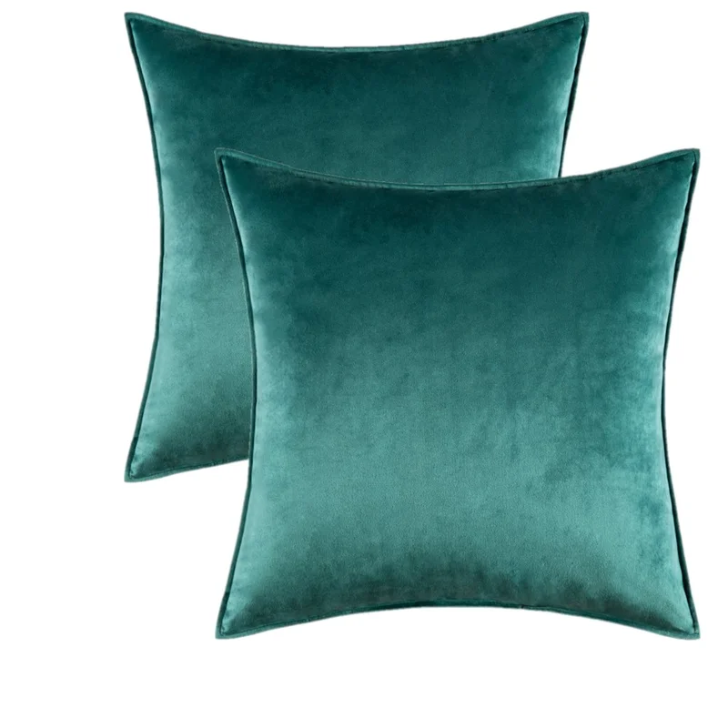 Velvet throw pillows in green-teal color